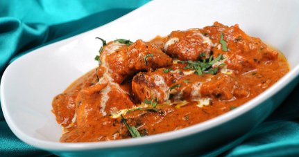 Murgh Tikka Lababdar (Non-Veg): Boneless pieces of marinated chicken, char grilled, finished in a rich tomato gravy, flavored with tempered chopped onion, ginger and garlic