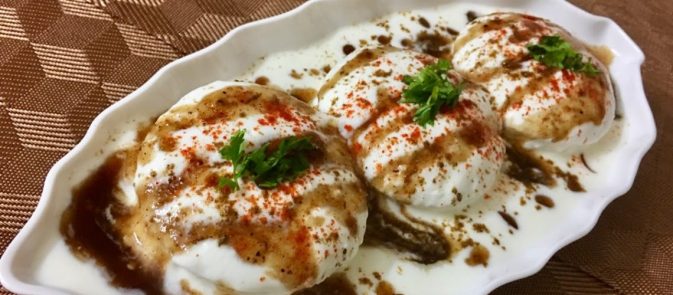 Dahi Bhalla: lentil dumpling served in yoghurt and tamarind sauce