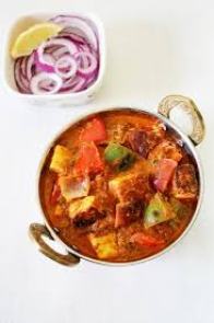 Paneer Tikka Masala (Vegetarian): Homemade cottage cheese cubes, bell pepper, onion and tomatoes cooked in kadai with special sauce